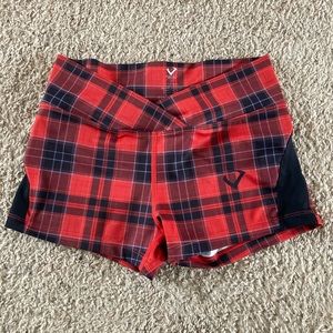 Violate the Dress Code Plaid Small Shorts.
